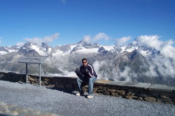 Gagan with a panorama of snow-covered Swiss mountains
