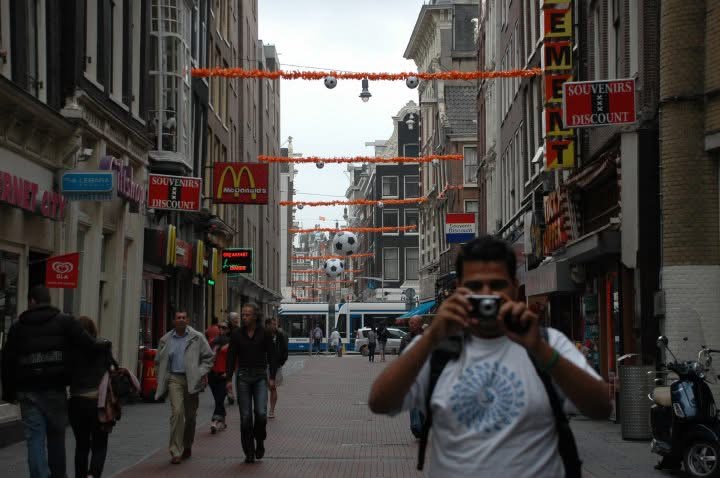 Gagan taking a photo on an Amsterdam street