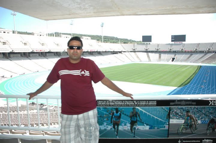 Gagan in the stands of a Barcelona stadium