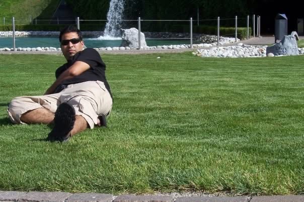 Gagan resting on a grassy lawn during the 2010 trip