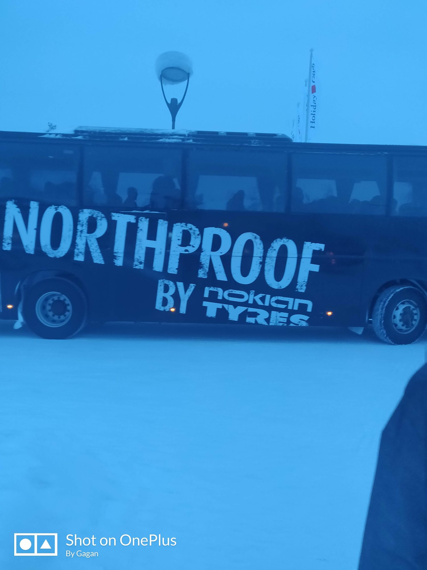 Bus at a snowy northern stop