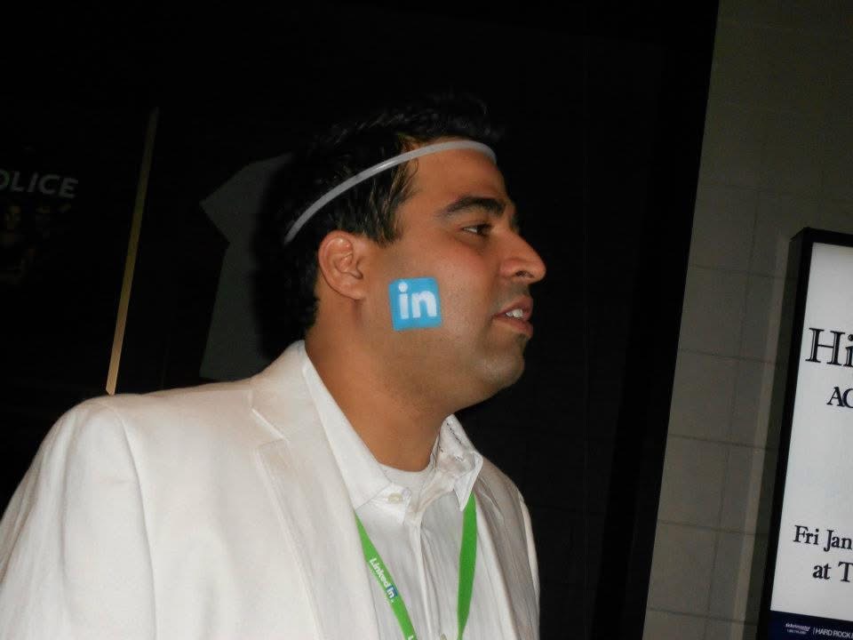 Gagan wearing a LinkedIn sticker at the 2012 gathering