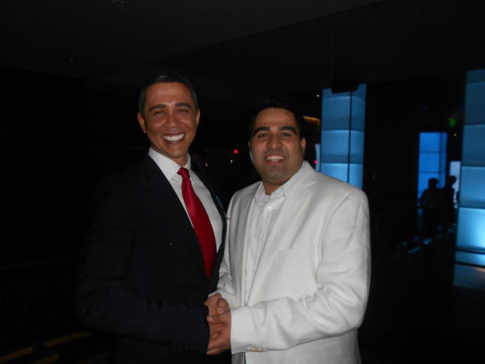Gagan posing with an entertainer in Las Vegas