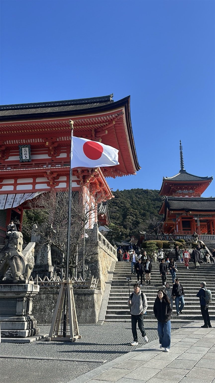 Japanese flag and red temple building