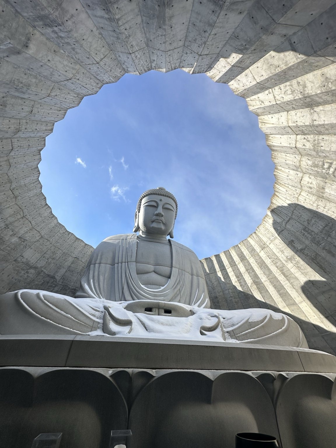 Large Buddha framed by a circular opening
