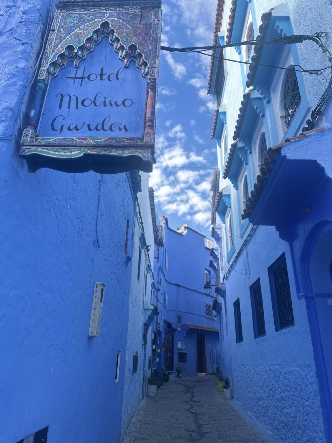 A narrow blue-painted lane in Morocco