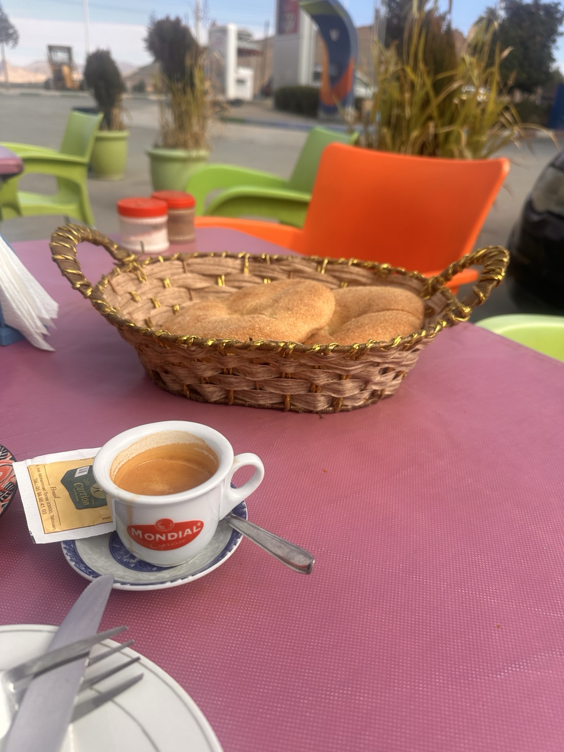 Espresso and a basket of bread at a roadside stop in Morocco